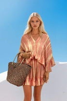 Peach silk kaftan dress by Lindsey Brown silk resort wear