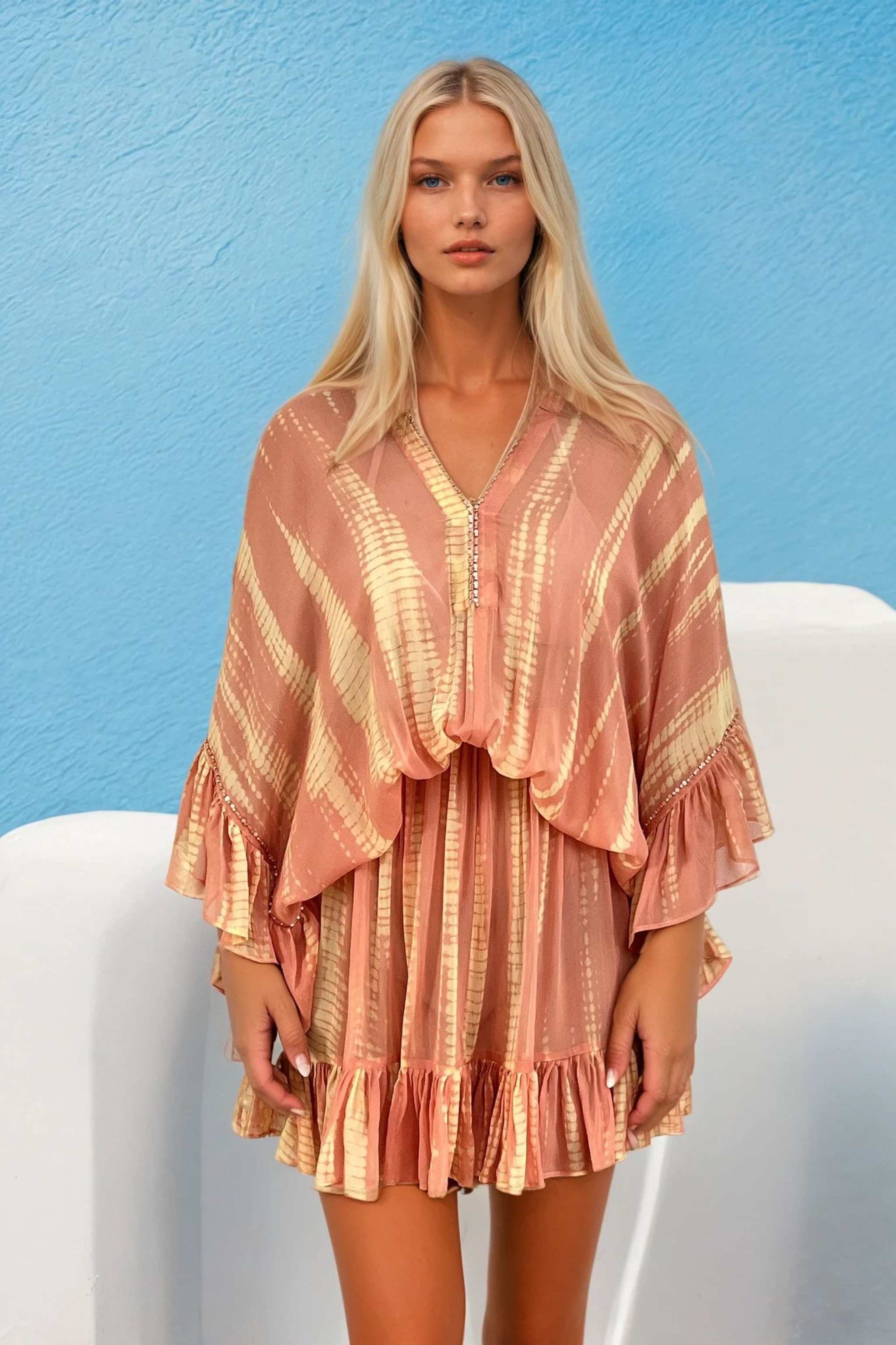 Peach silk kaftan dress to wear on holiday in the Caribbean by Lindsey Brown