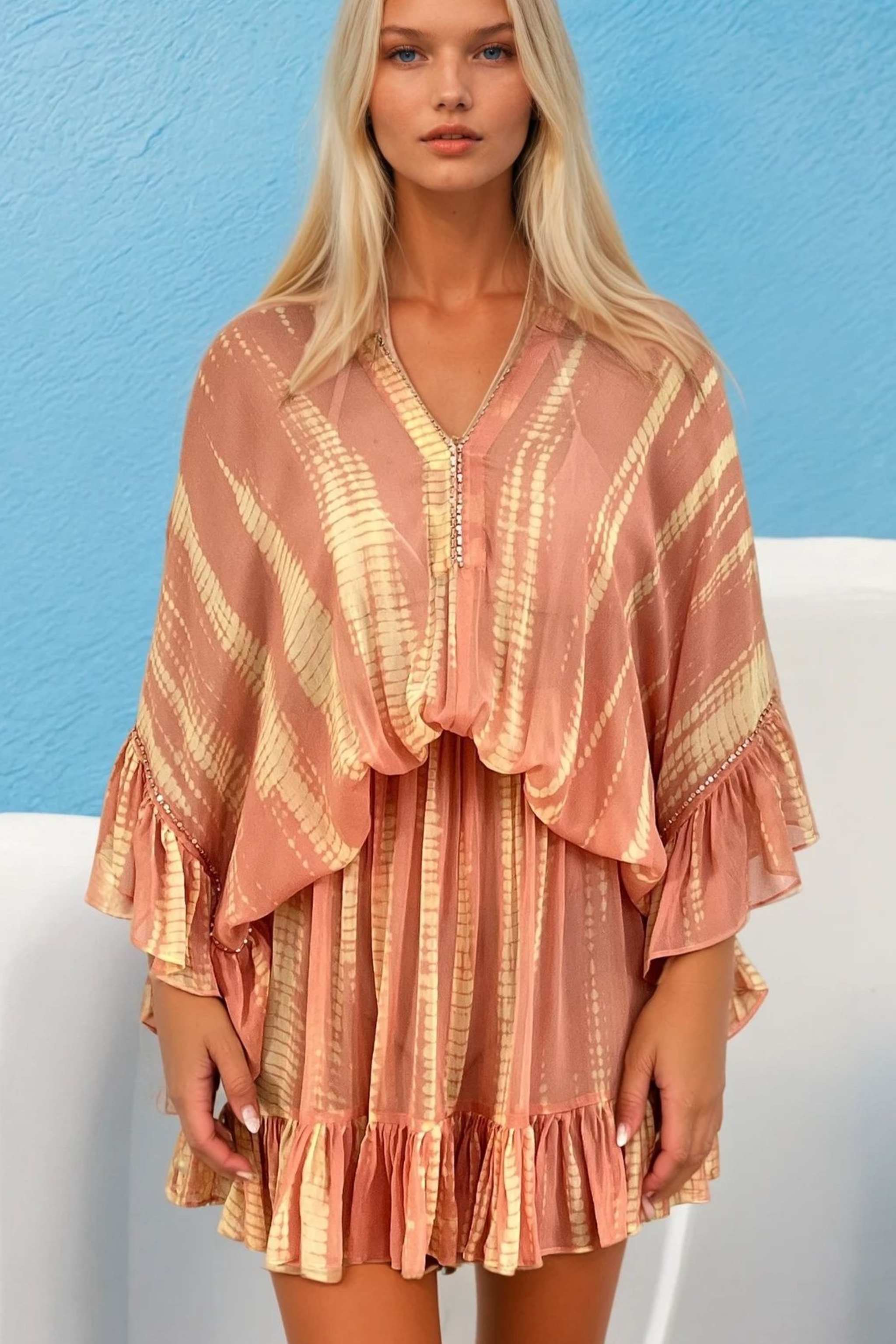 Peach silk kaftan dress to wear on holiday in the Caribbean by Lindsey Brown resort wear 