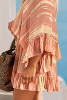 Peach silk kaftan with rose gold detail by lindsey brown luxury resort wear 