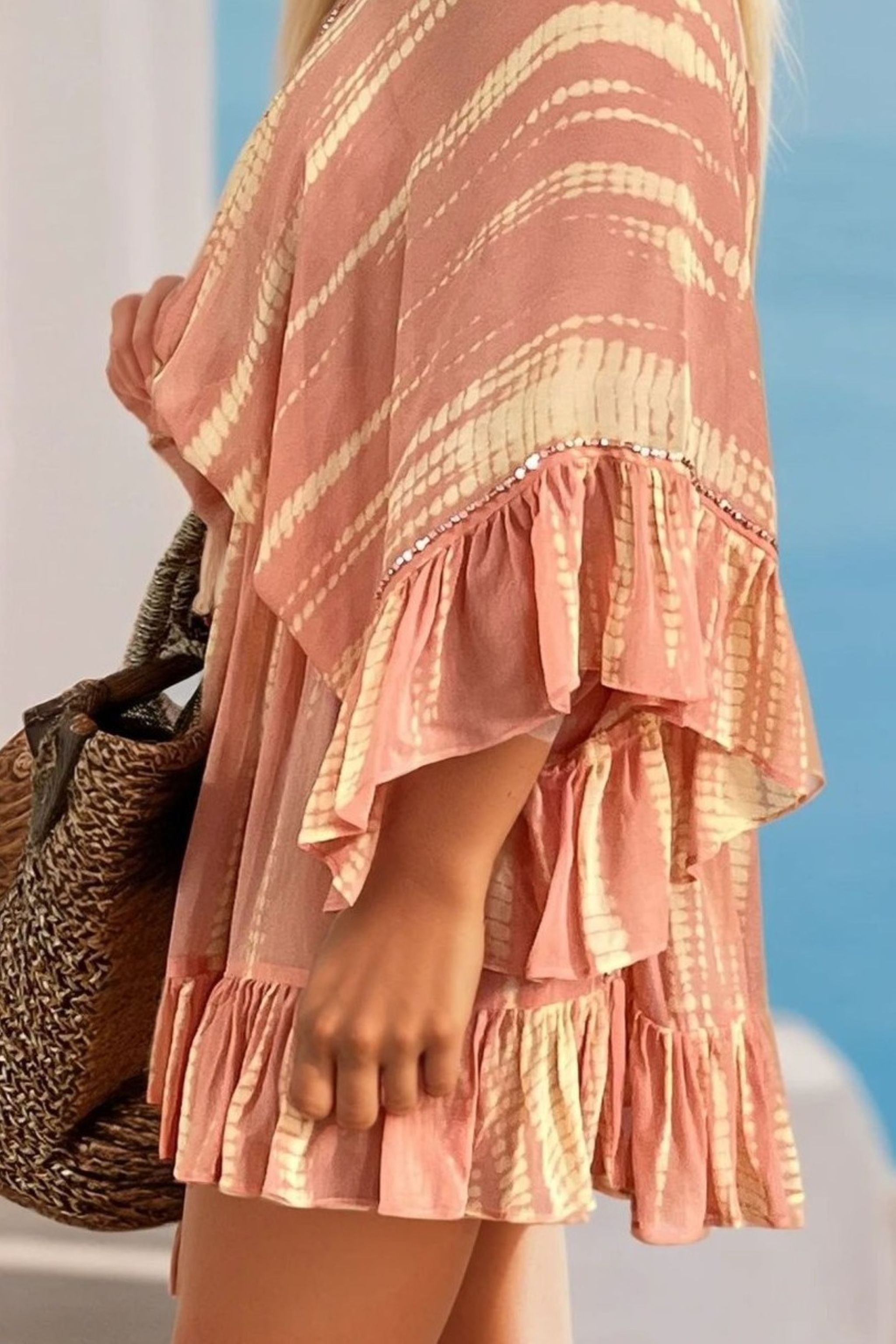 Peach silk kaftan with rose gold detail by lindsey brown luxury resort wear 