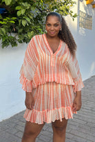 Peach tie dye silk drop waisted silk kaftan dress by Lindsey Brown to wear in the Caribbean