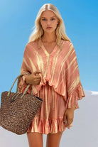 Peach silk kaftan dress by Lindsey Brown silk luxury resort wear