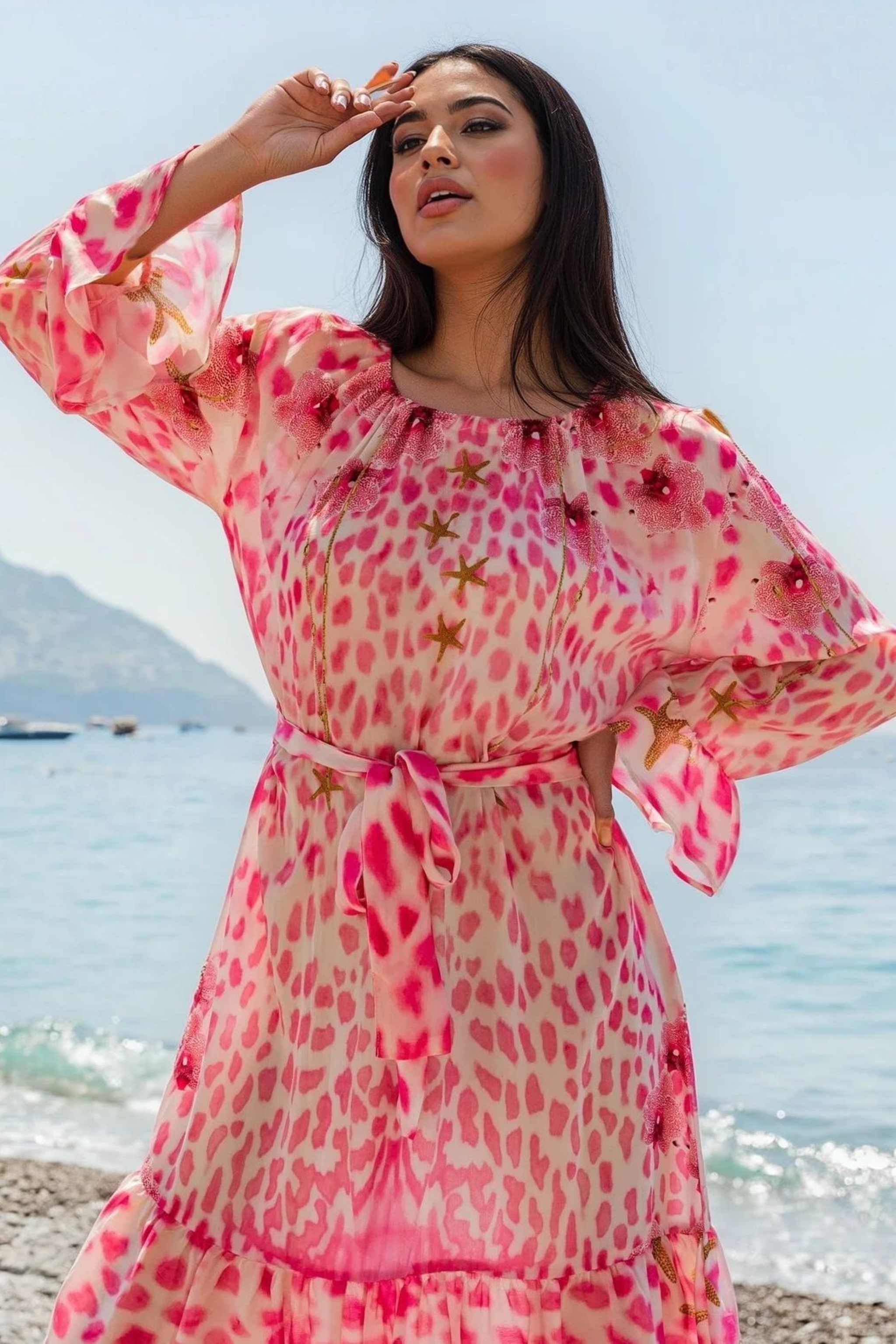 pink silk animal print long sleeved dress to wear on holiday by Lindsey Brown