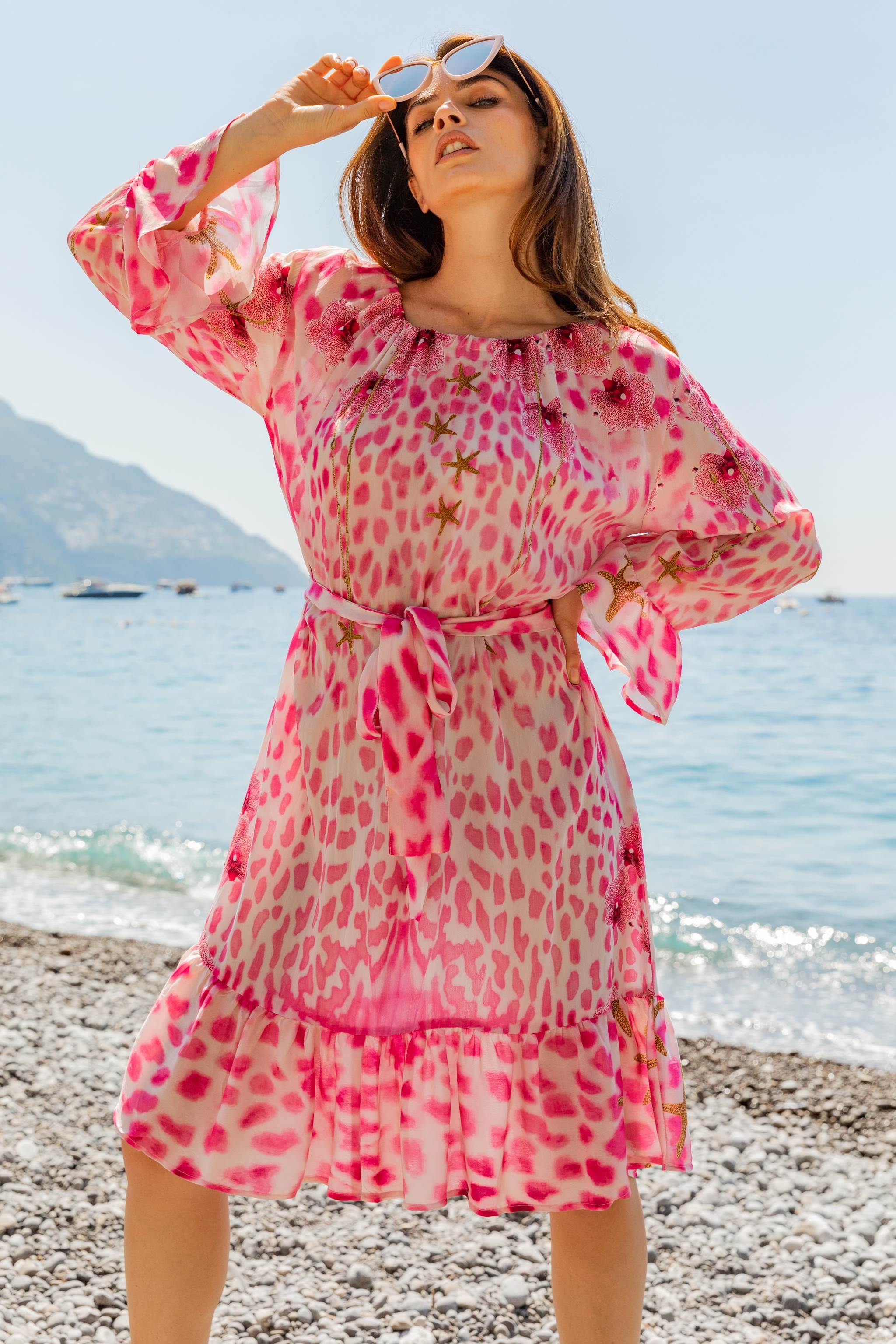 Pink animal print  knee length dresses to wear on a Caribbean holiday by Lindsey Brown silk resort wear 