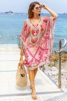 Pink silk designer kaftans to wear on luxury holidays by Lindsey Brown luxury resort wear .