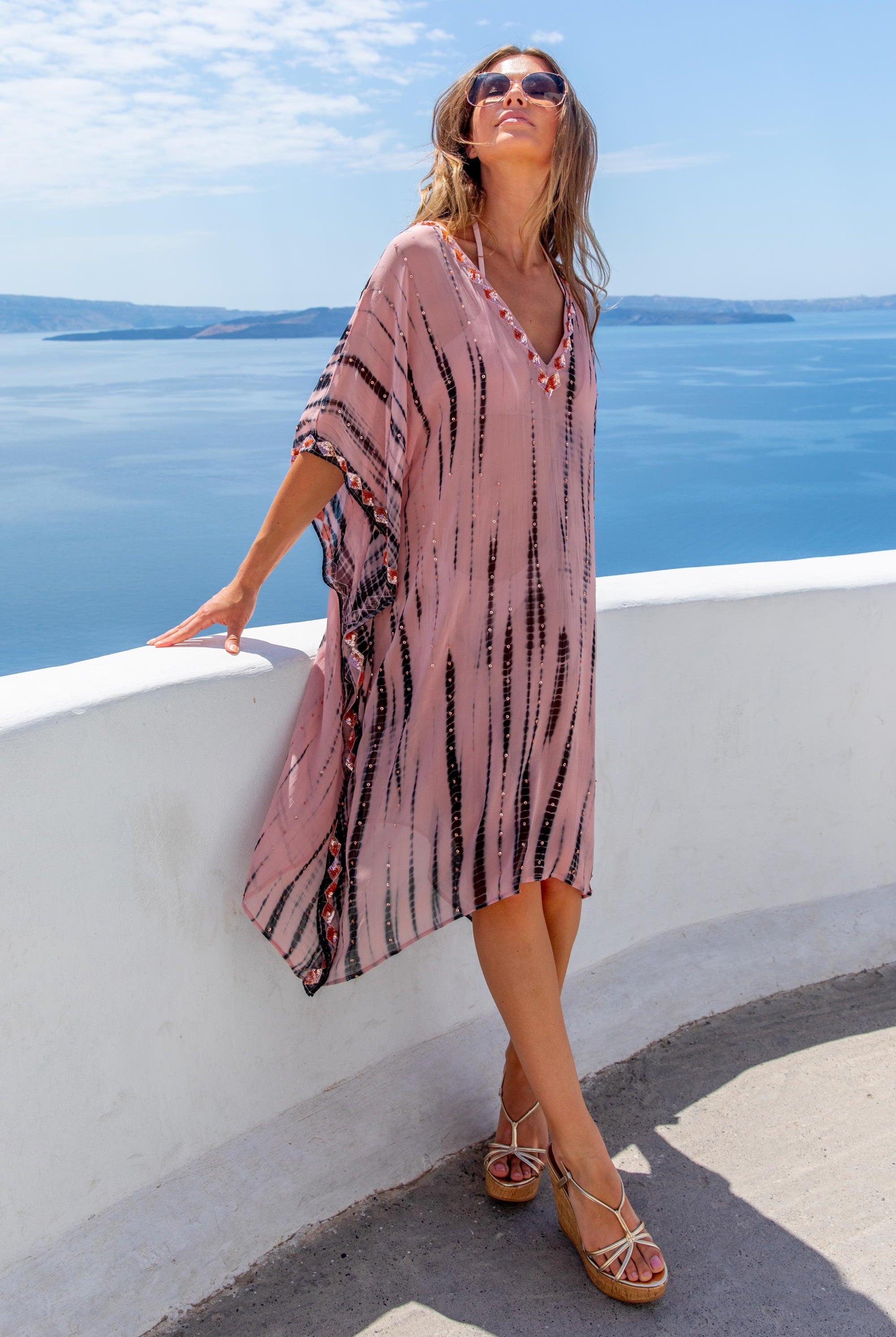 Plus Size Pink silk floaty deisgner kaftans to wear on holiday by Lindsey Brown luxurey resort wear 