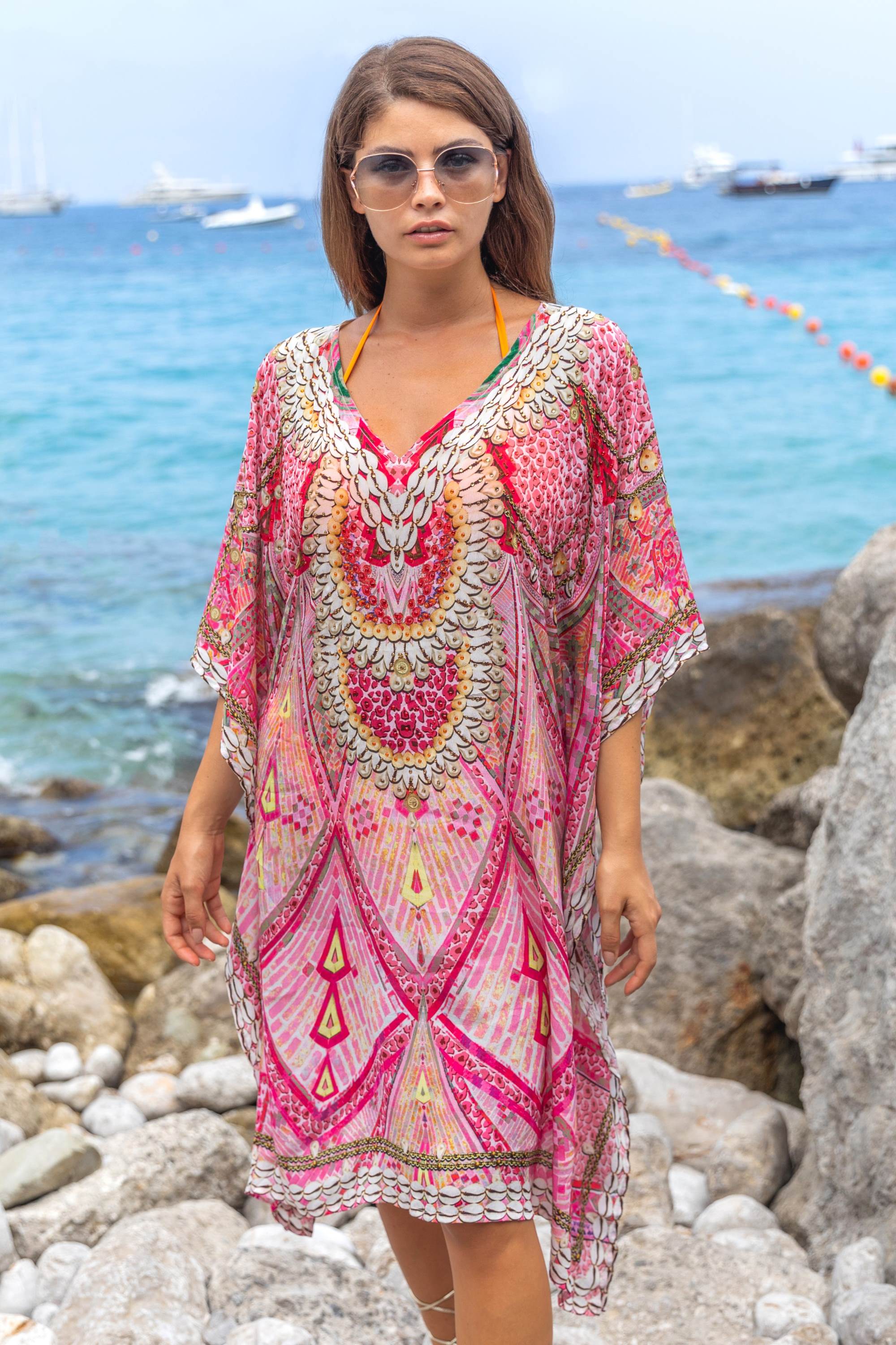 Pink silk floaty designer kaftans to wear on holiday by Lindsey Brown luxury resort wear 