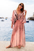 Pink silk maxi kaftan dresses and pink resort wear maxi kaftans by Lindsey Brown luxury resort wear 