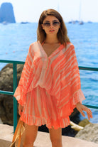 Silk Orange luxury kaftan dresses to wear on holiday by Lindsey Brown luxury resort wear 