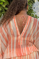 Peach bloused silk kaftan dress to wear on a Caribbean Cruise by Lindsey Brown resort wear