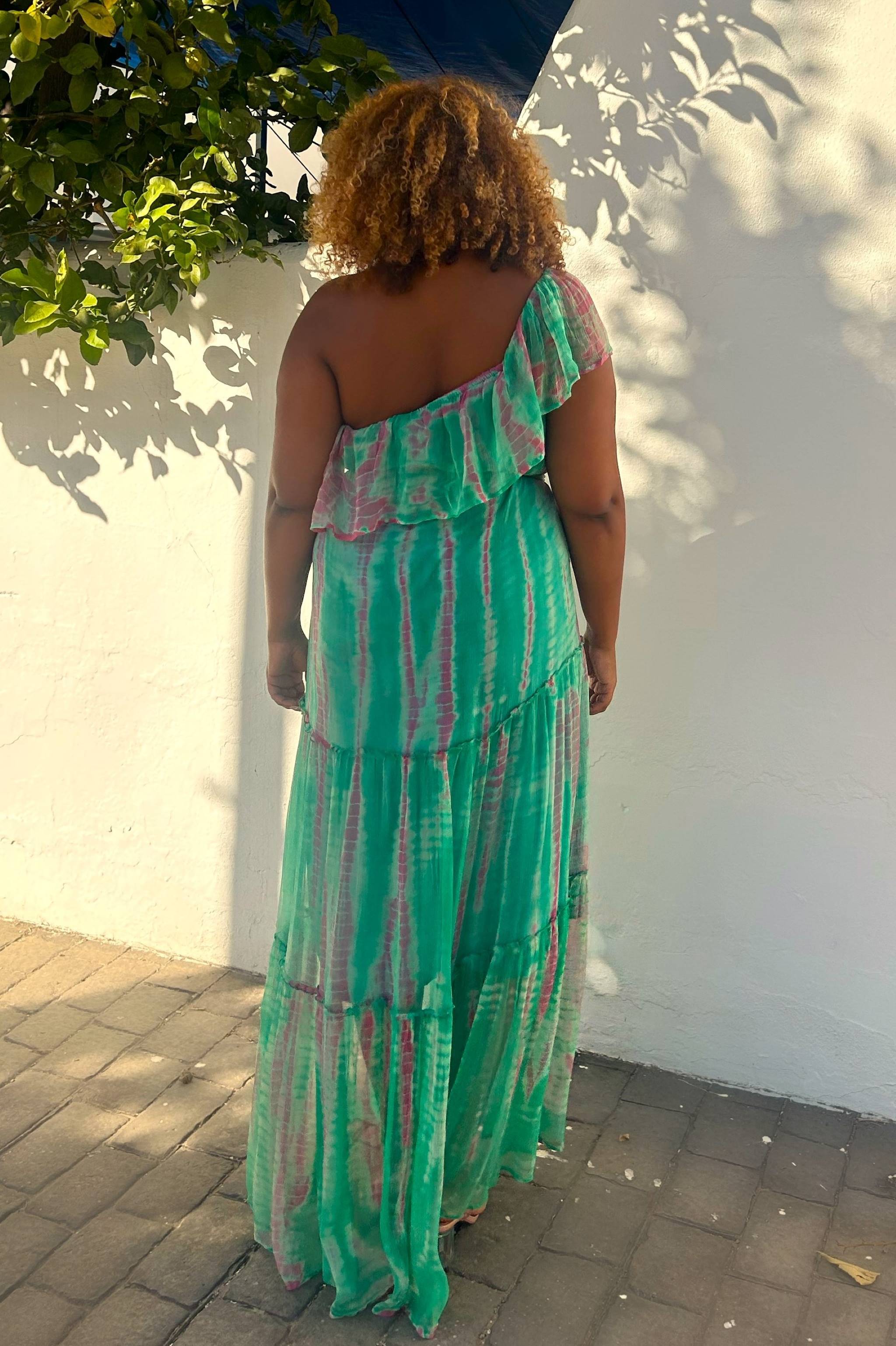 Stunning silk hoilday dresses to wear on holiday by Lindsey Brown designer resort wear 