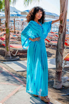 Turquoise Blue Silk Maxi Kaftan by Lindsey Brown luxury resort wear 