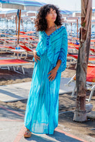 Turquoise blue silk maxi kaftans by Lindsey Brown luxury resort wear 