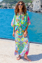 Turquoise multi coloured silk light weight silk jacket to wear on holiday by Lindsey Brown luxury resort wear 