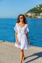 White cotton beach dresses in loose and floaty cotton by Lindsey Brown resort wear 