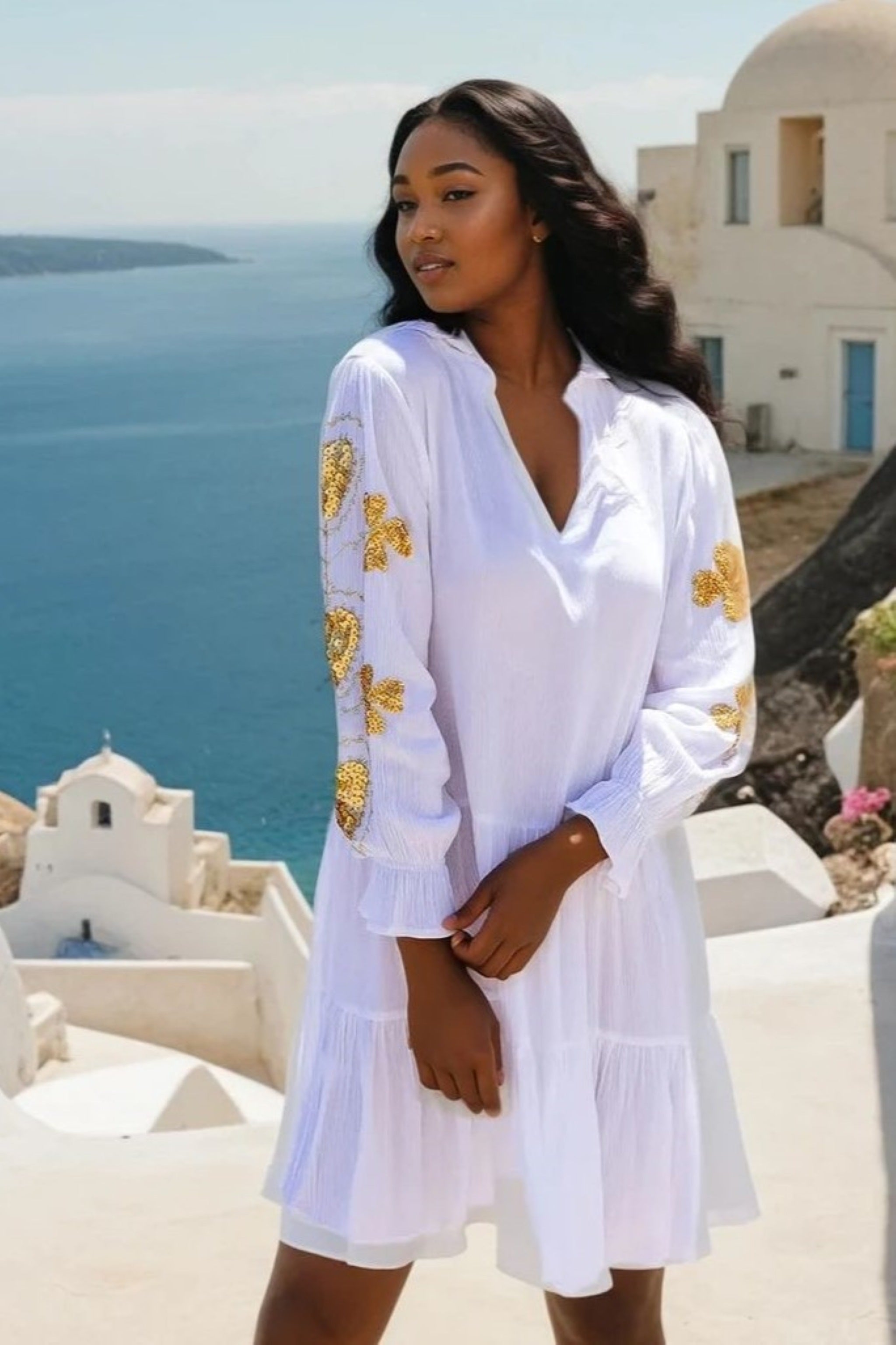white gold cotton dress with long sleeves to wear in summer and on holiday by Lindsey Brown 
