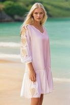 white cotton knee length beach dress by Lindsey Brown resort wear 