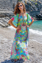 Yellow turquoise silk maxi kaftans to wear on holiday by Lindsey Brown luxury resort wear 