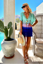 aqua tie dye ombre silk kaftan dress to wear on a luxury holiday by lindsey brown resort wear 