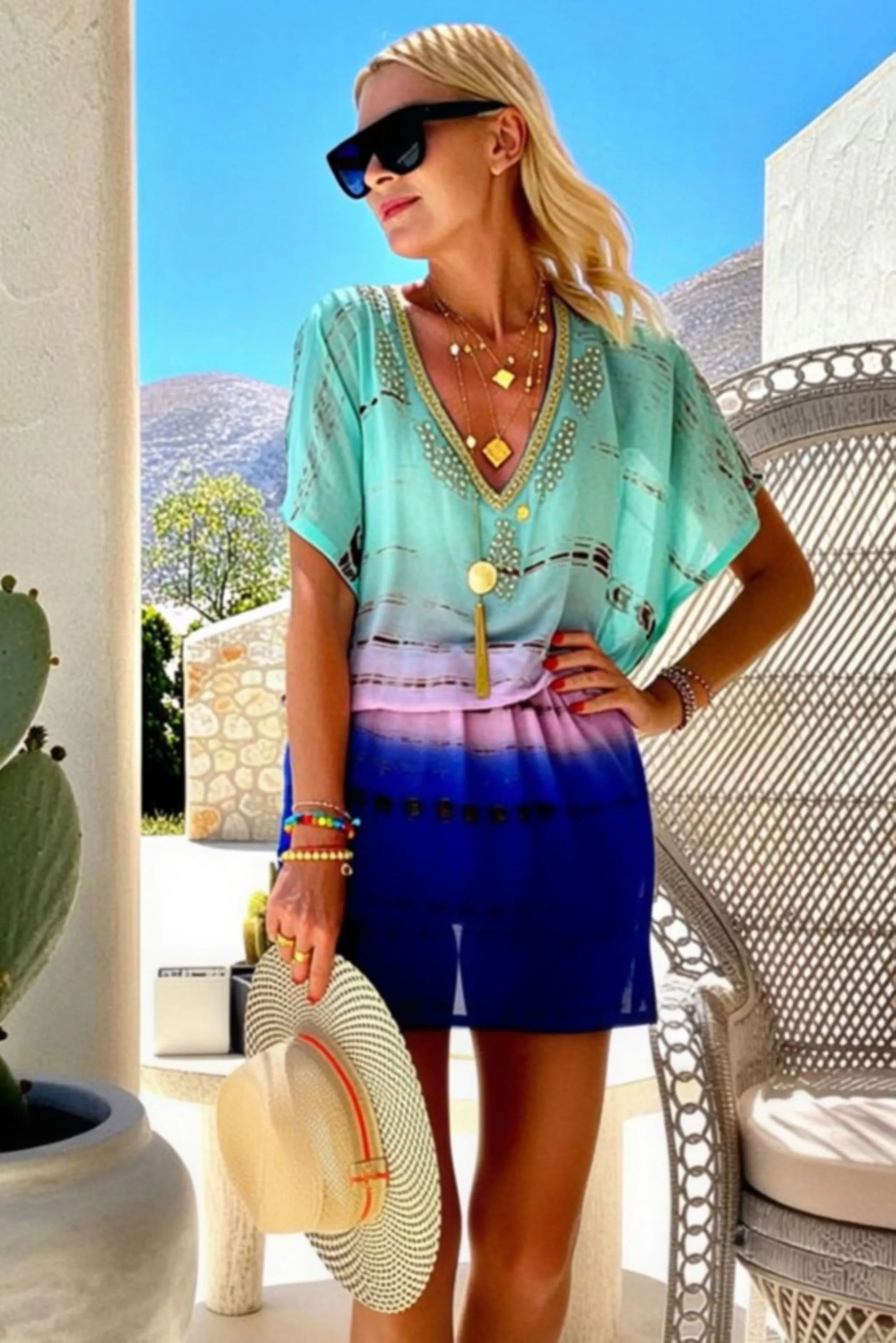 aqua and gold ombre silk kaftan dress to wear on a luxury holiday by lindsey brown silk resort wear 