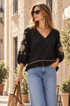 black cotton v neck blouse by Lindsey Brown
