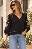 black cotton loose fitting blouse by Lindsey Brown