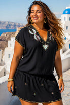 black plus size cotton bloused beach dress to wear on holiday by lindsey brown luxury resort wear 