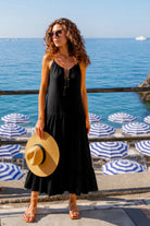 black cotton sleeveless beach dress to wear on holiday by Lindsey Brown