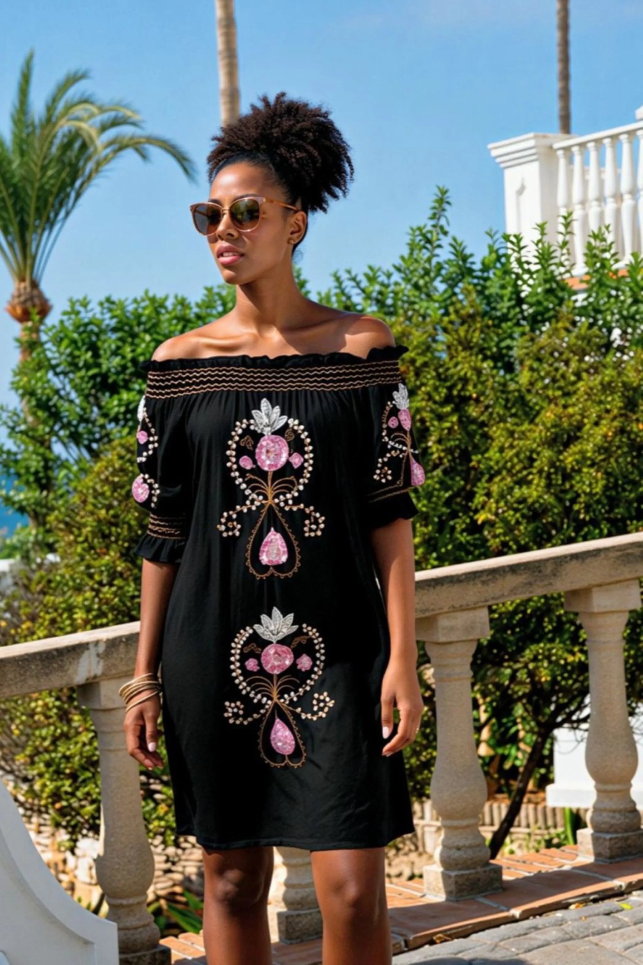 black strapless off the shoulder dresses to wear on holiday by lindsey brown
