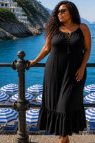 black plus size midi dresses to wear on holiday by Lindsey Brown resort wear 