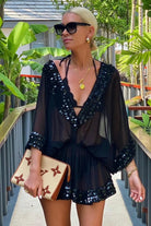 black short v neck silk kaftan dress worn by Anna Mavridis