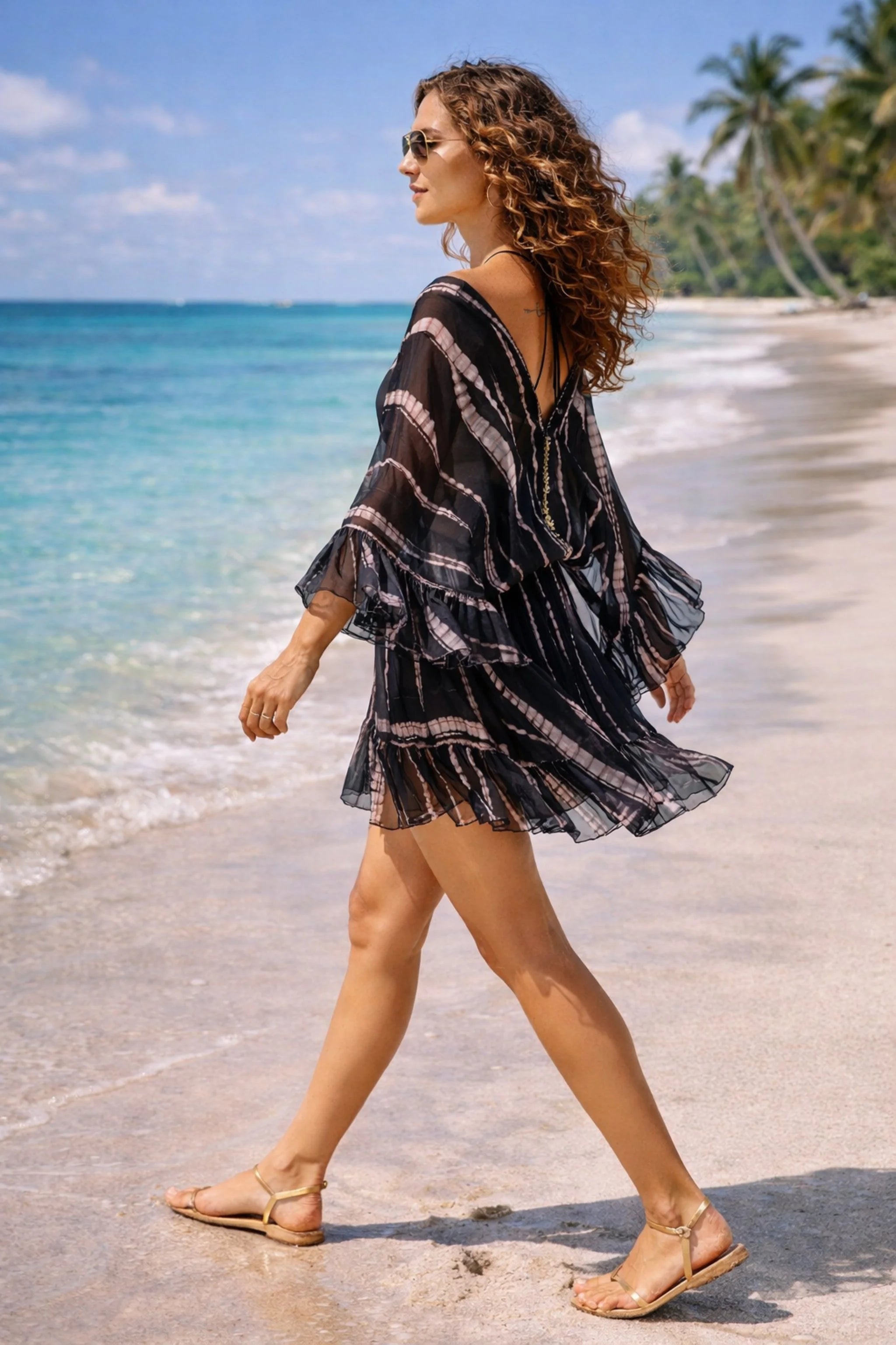 Black silk luxury bloused kaftan dresses by Lindsey Brown resort wear