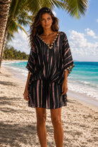 black and rose gold silk drop waist kaftan by Lindsey Brown resort wear to wear on holiday
