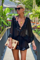 black short silk kaftan dress worn by Anna Mavridis