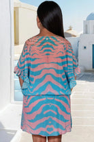 blue pink back view of plus size printed beach dress by Lindsey Brown