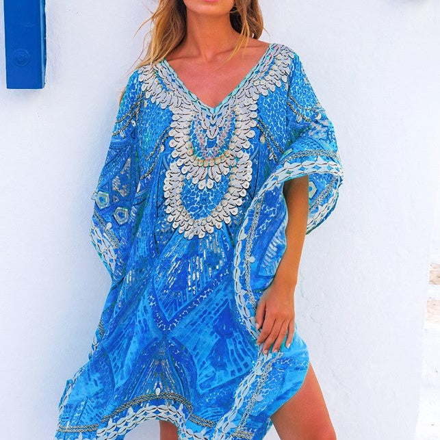 blue short silk designer kaftan to wear on holiday by lindsey brown resort wear 