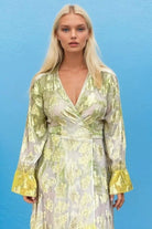 ivory gold long sleeve resort wear dress by Lindsey Brown