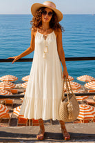 ivory sleeveless midi dress to wear on holiday by Lindsey Brown resort wear 
