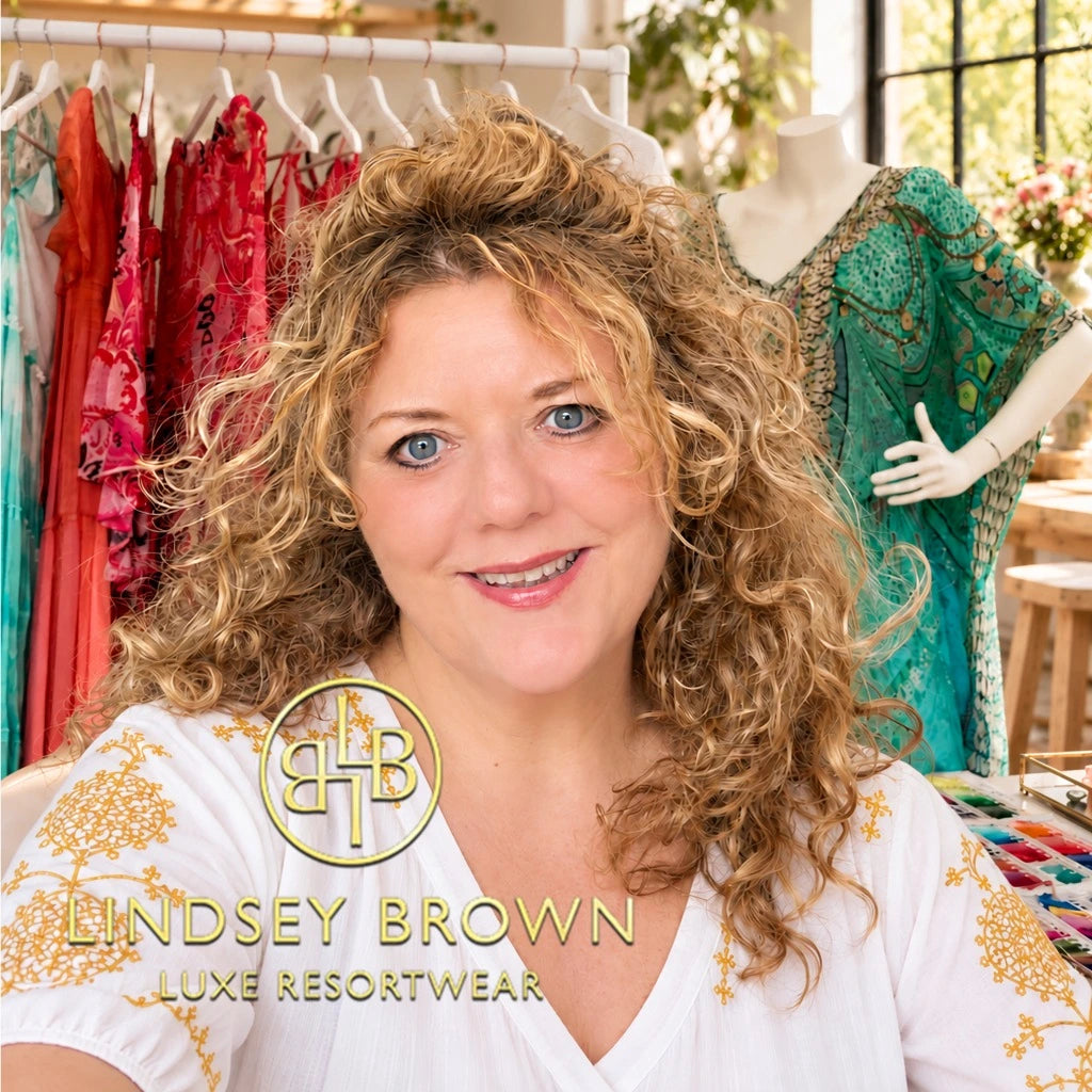 Lindsey Brown, branded image of the British fashion designer, in her designer studio, with garments and designs.