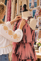 Lindsey Brown, fashion designer in her design studio