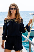 Positano black cotton off-the-shoulder holiday top with gold metallic shoulders, by Lindsey Brown.