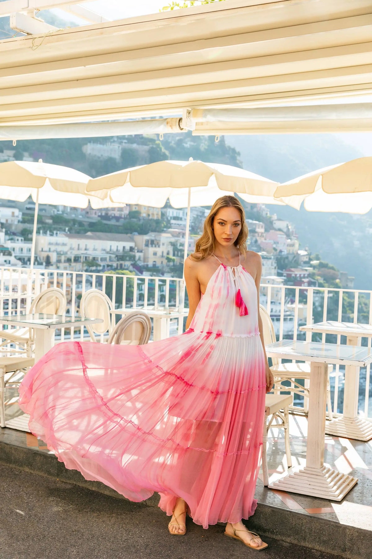 Scenic view of Santorini pink and white floaty silk chiffon maxi dress, by Lindsey Brown.