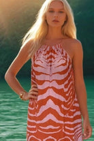 orange and pink floaty sleeveless maxi dress by Lindsey Brown resort wear