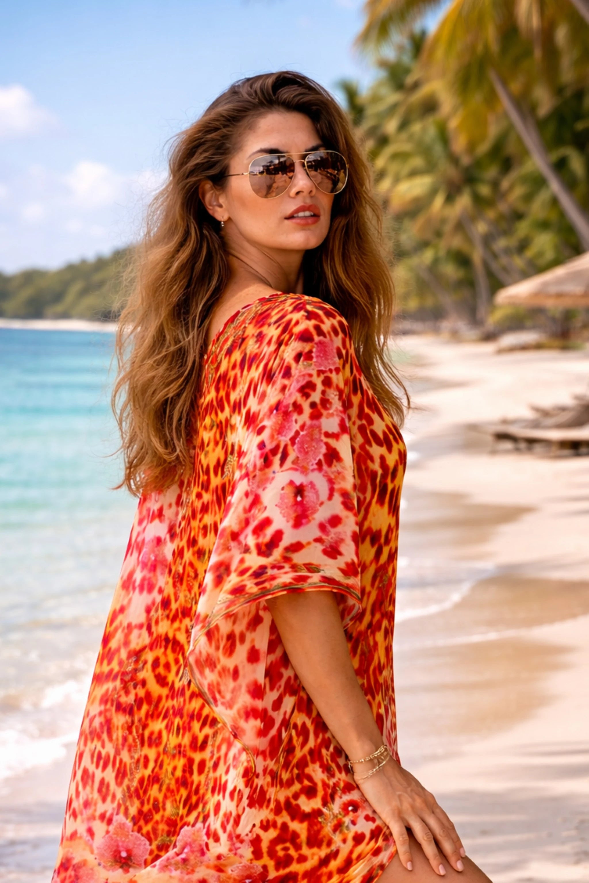 orange and red animal printed silk beach coverup to wear on a cruise holiday  by lindsey brown resort wear 
