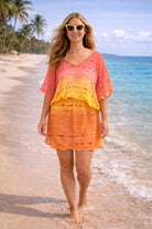 orange  pink yellow  silk designer kaftan dress to wear on a luxury holiday by lindsey brown resort wear 