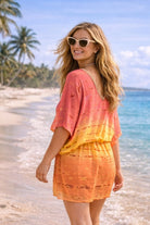 orange  pink yellow ombre silk designer kaftan to wear on a luxury holiday by lindsey brown resort wear 