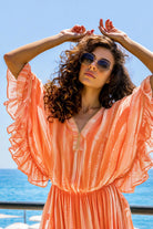 orange silk bloused designer kaftan by Lindsey Brown resort wear 