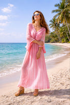 pink silk maxi kaftans to wear on a luxury holiday by lindsey brown resort wear 