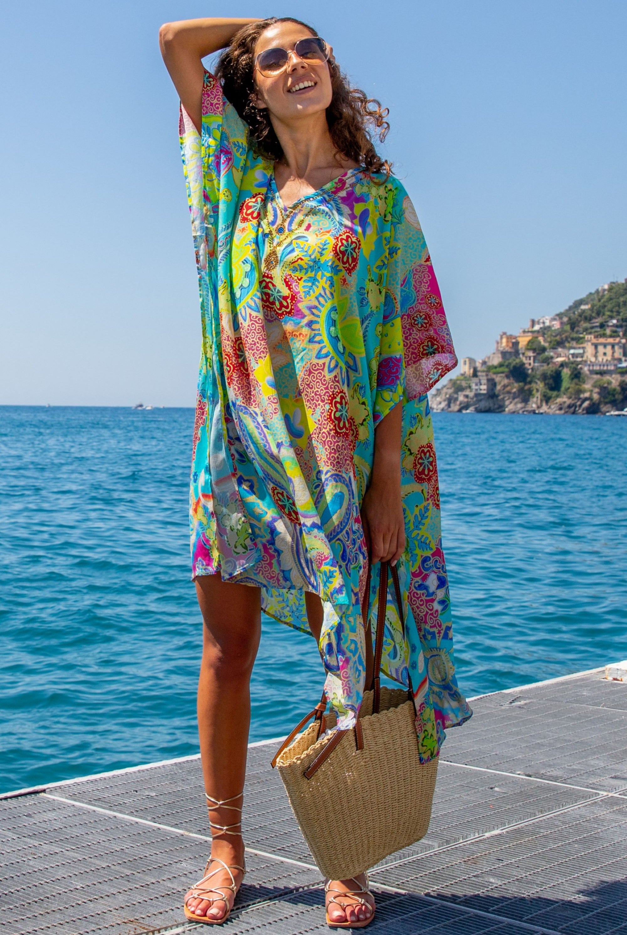 plus isze yellow turquoise silk designer kaftans to wear on holiday by Lindsey Brown silk resort wear 